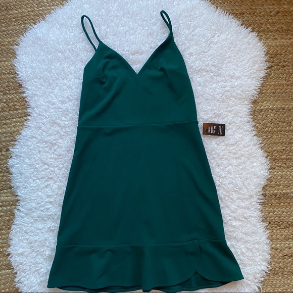 emerald green fit and flare dress